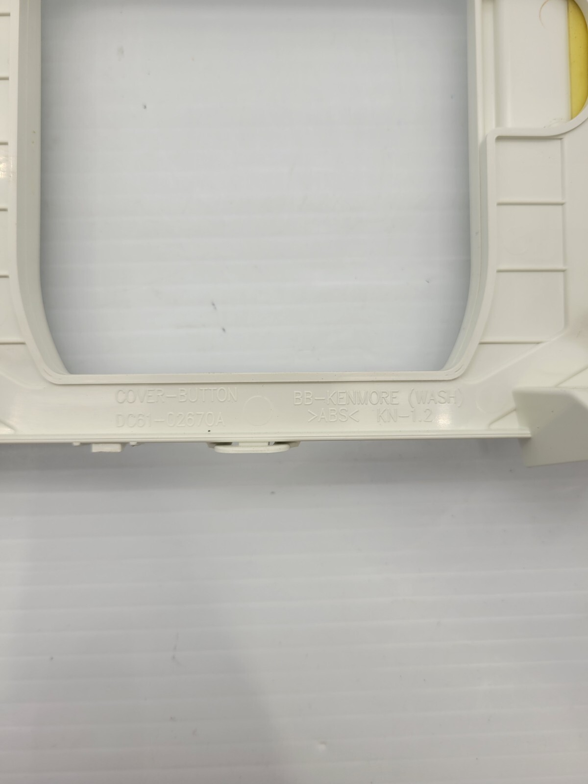 Genuine Kenmore Cover button Part #DC61-02670A